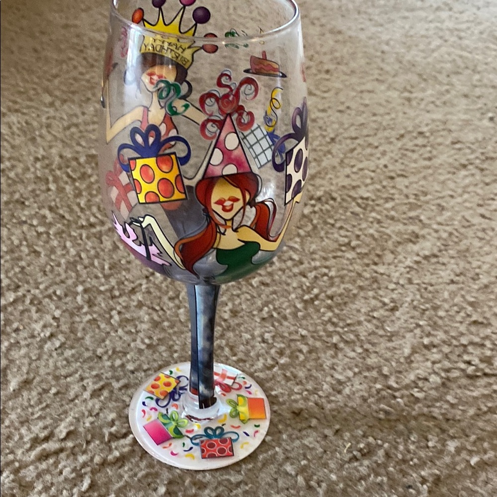 Vibrant Red and Purple Glass Art with Whimsical Design